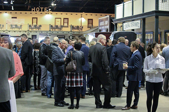 Photo of people mingling at the MCAS President's Reception at the Western Development Museum